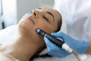 close-up-of-woman-getting-facial-hydro-microdermab-idluxurymedspa